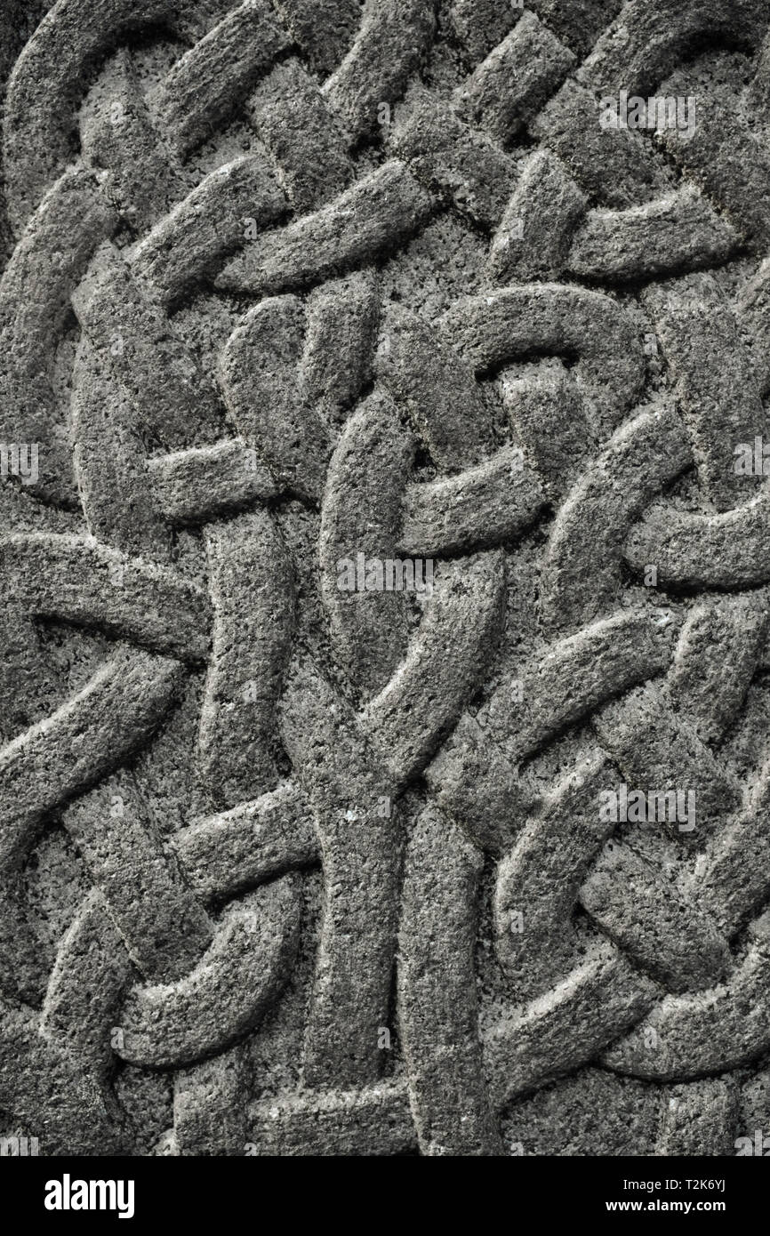 Zusammenfassung Hintergrund Detail einer keltischen Knoten Muster in Stein Stockfoto