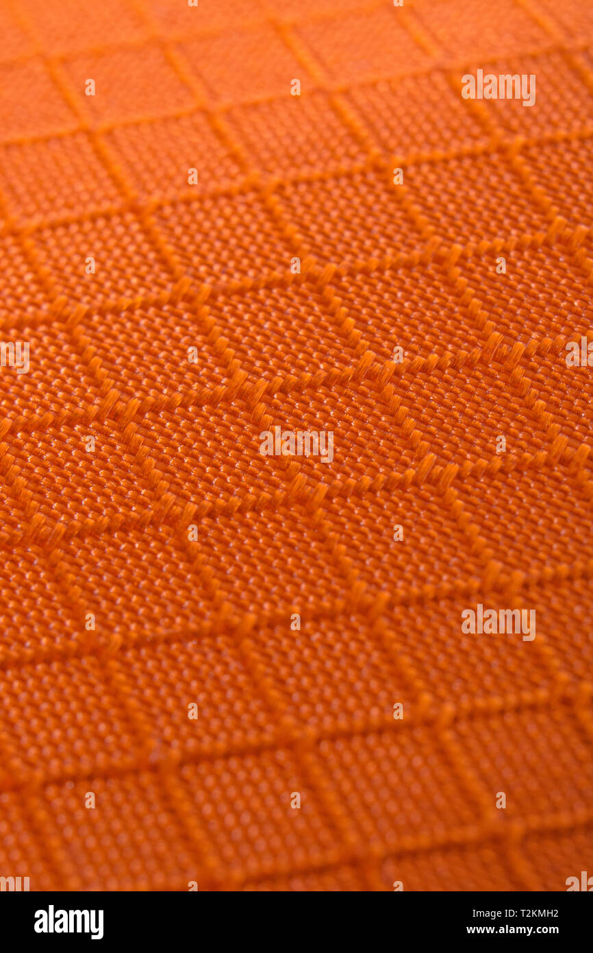 Close-up Makro der hellen orange Art der wasserdichtes Material aus Polyester. Stockfoto