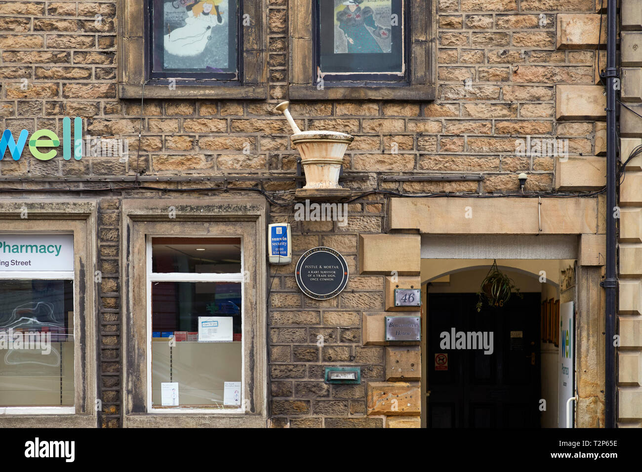 Ein Stößel und Mörser alten Handels Zeichen außerhalb ein Chemiker in Lancaster Stockfoto