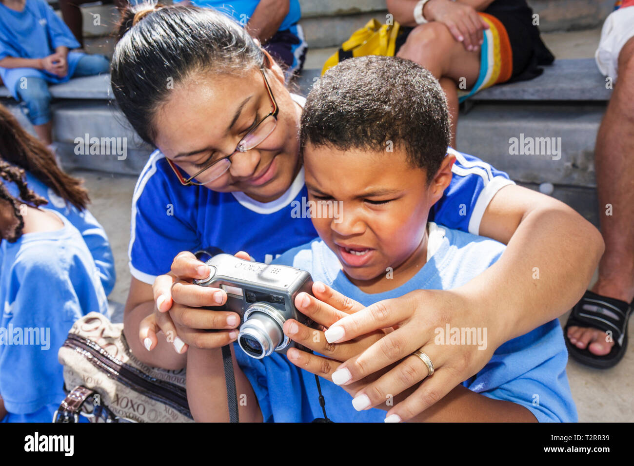 Miami Florida, Moore Park, Ashe Buchholz Tennis Center, NCAA Tennis Match, University of Miami, Boston College, Sport, Mentoring, nach der Schule, Innenstadt Kinder Stockfoto