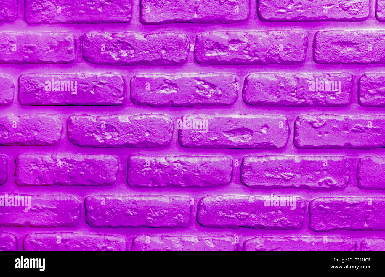 Proton lila Ziegel Hintergrund. Farbe des Jahres 2019. Modernes trendiges neon Textur für Design Stockfoto