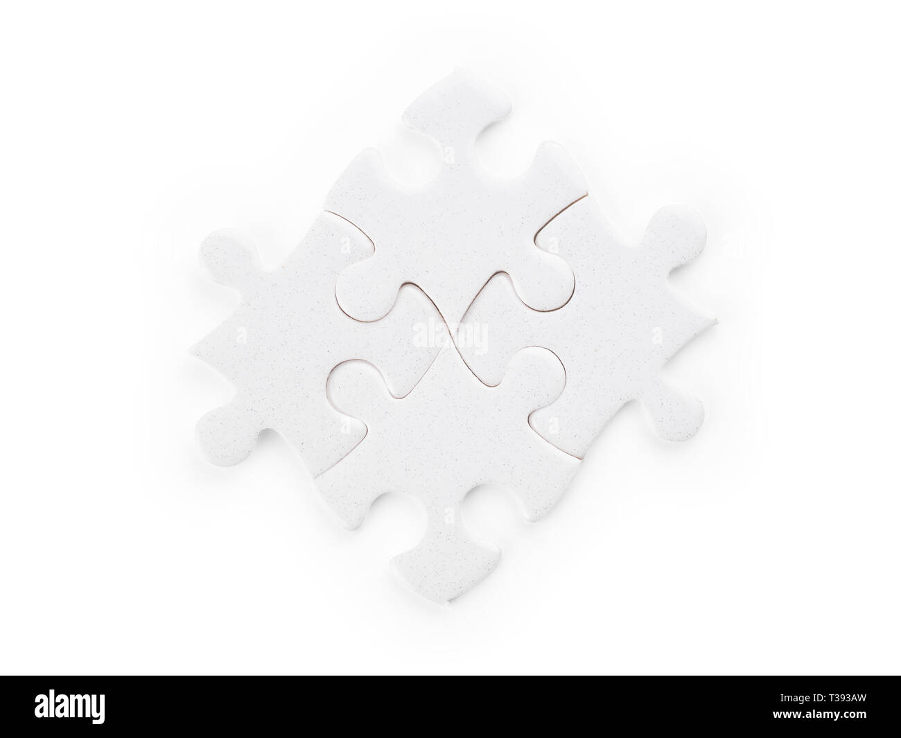 Vier weißen Puzzleteile. Auf weißen, Beschneidungspfade getrennt ausgewiesen Stockfoto
