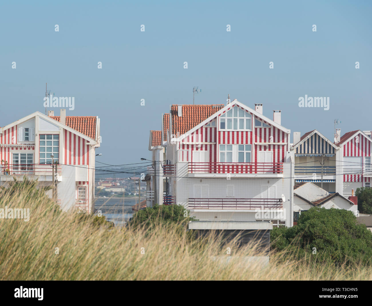 Die Candy striped Strand Häuser in Costa Nova, Aveiro, Portugal Stockfoto