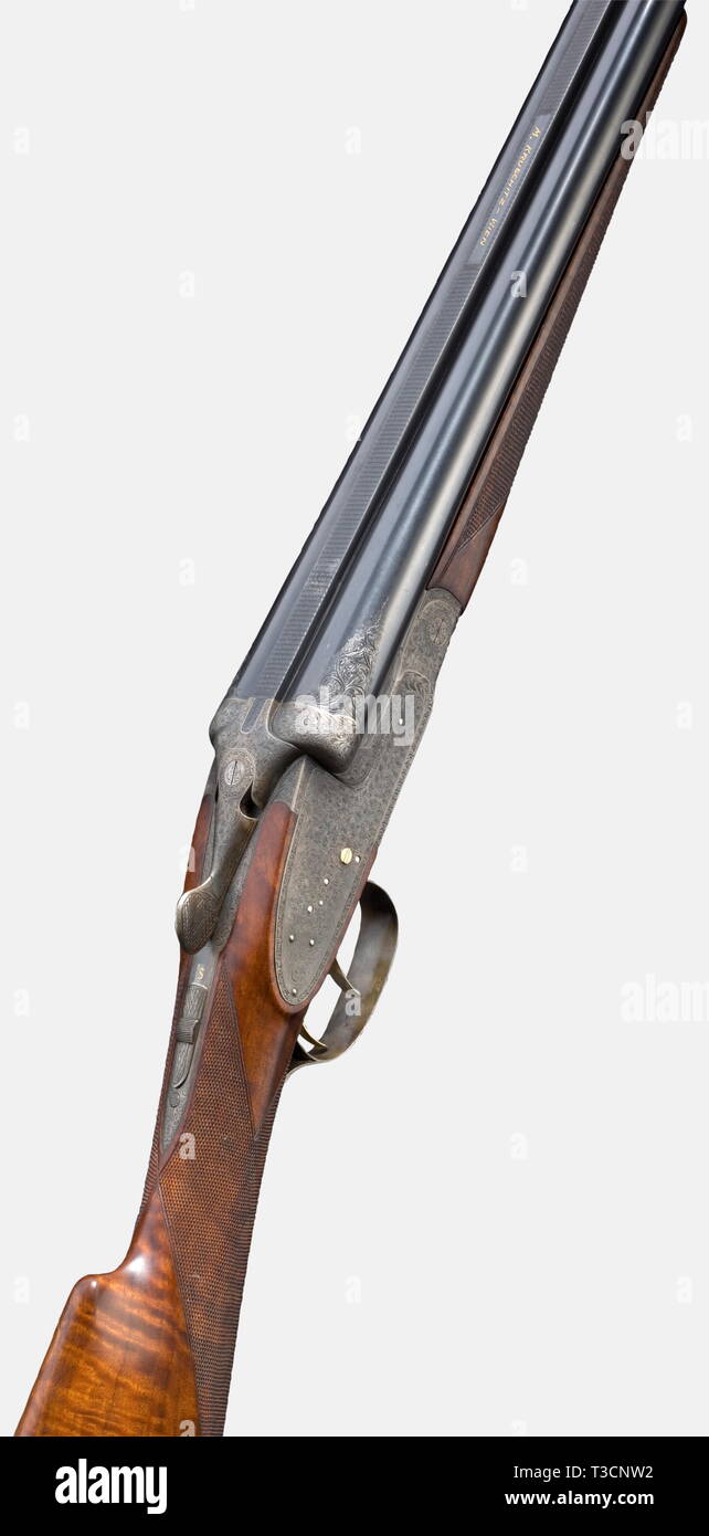 Eine herrliche side-by-side Shotgun, Martin Kruschitz jun. in Wien, ca. 1973, Cal., Nr. 12/70 25.2181. Spiegel - wie Bohrungen, nur minimalste Gebrauchsspuren, an Orten, dünne Oberfläche, bezeichnet: "BÖHLER RASANT' und in Gold auf der gefrästen Mittelrippe bin. KRUSCHITZ-WIEN, 1973 Wien Nachweis mark, Choke 3/4, 1/1, weiße Perle Anblick, Länge 67,5 cm. Grüner Schraube mit Double barrel Hakenverriegelung, echten seitlichen Schlösser à la Holland & Holland mit vergoldeten cocking Hebel, markante Stücke, Trigger und fangen Sie Bars, vergoldet Double Trigger, Gelenkwelle vorne Trigger, schieben Sie die Sicherheit auf SMA, Additional-Rights - Clearance-Info - Not-Available Stockfoto