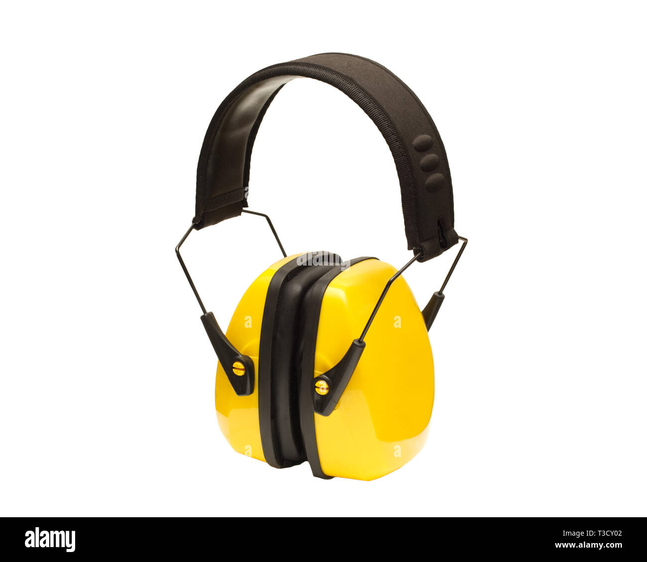Gelbe Arbeitskleidung schützende Ohrenschützer auf Weiß isoliert. Stockfoto