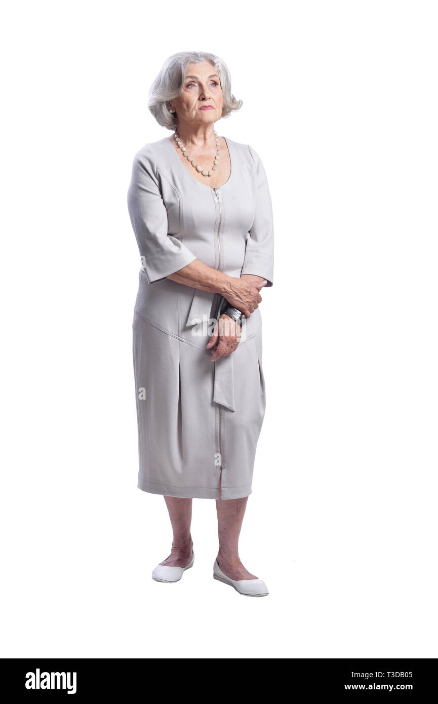 Portrait von traurige ältere Frau auf weißem Hintergrund Stockfoto