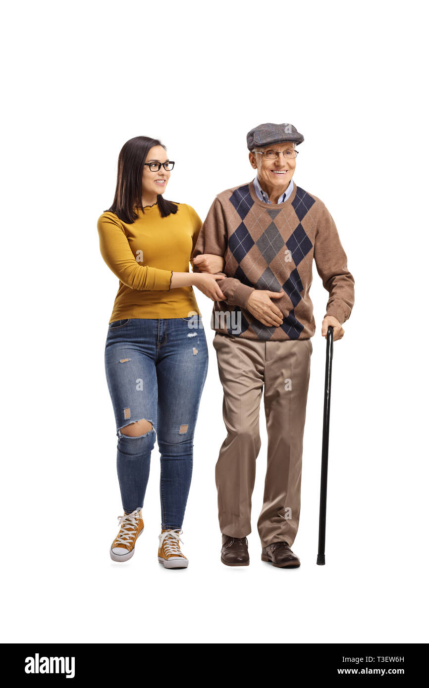 In voller Länge Porträt einer jungen Frau helfen, ein älterer Mann mit einem Stock auf weißem Hintergrund Stockfoto