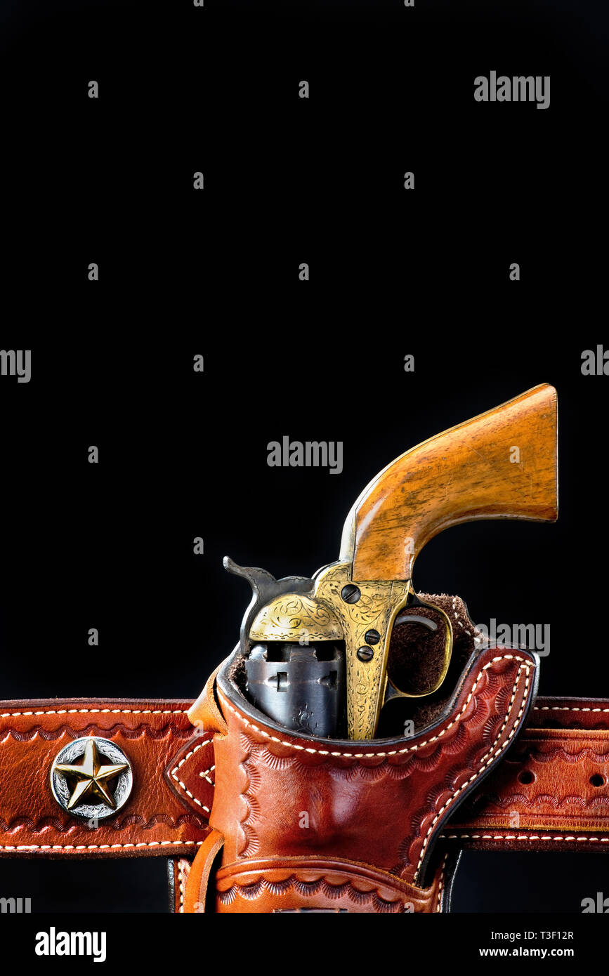 Antike Western Cowboy Pistole in Holster mit Raum für ihre tyoe. Stockfoto