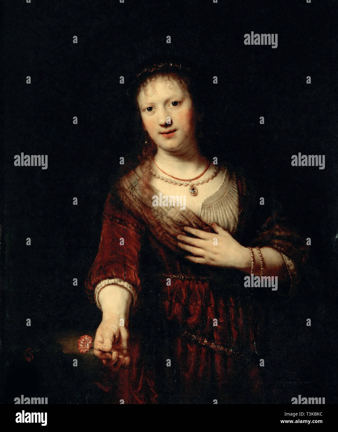 Saskia mit der roten Blume, 1641. Schöpfer: Rembrandt van Rhijn (1606-1669). Stockfoto
