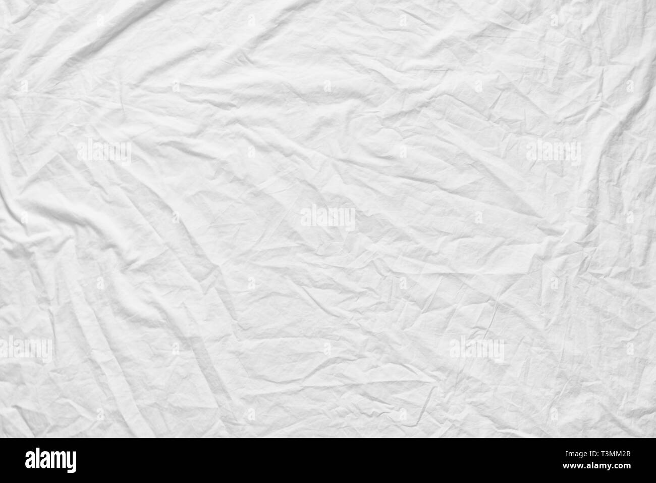 Weiß fabic Textur zerknittert Textur, Soft Focus weiße fabic von Betten Blatt zerknüllt sie uns Hintergrund Stockfoto