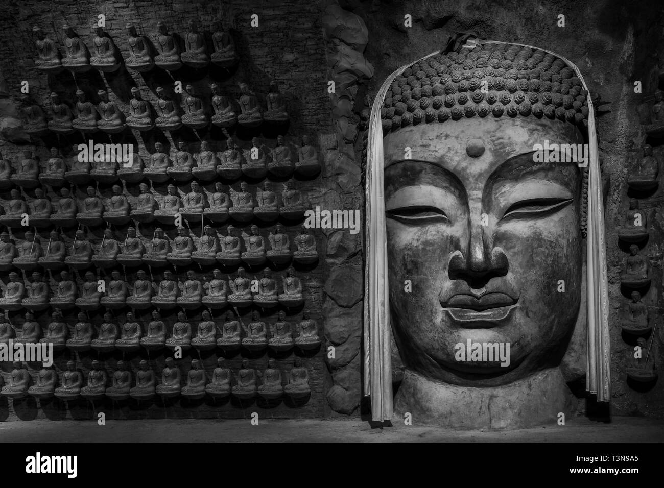 Buddha, tausend Buddha Berg, Berg Qianfo Wanfo Höhle, Jinan, Provinz Shandong, China Stockfoto