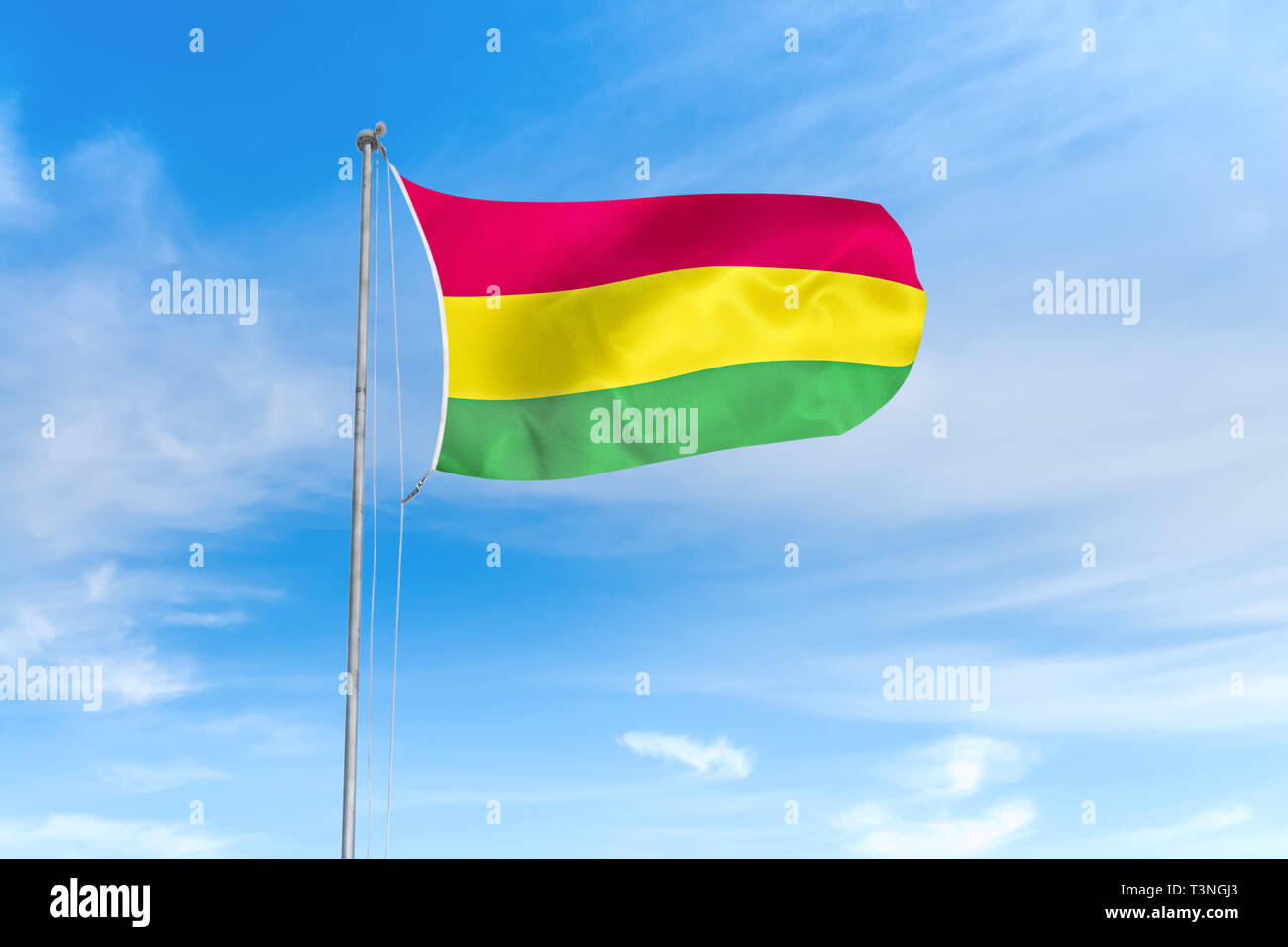 Bolivien Fahne weht im Wind über blauen Himmel Hintergrund Stockfoto
