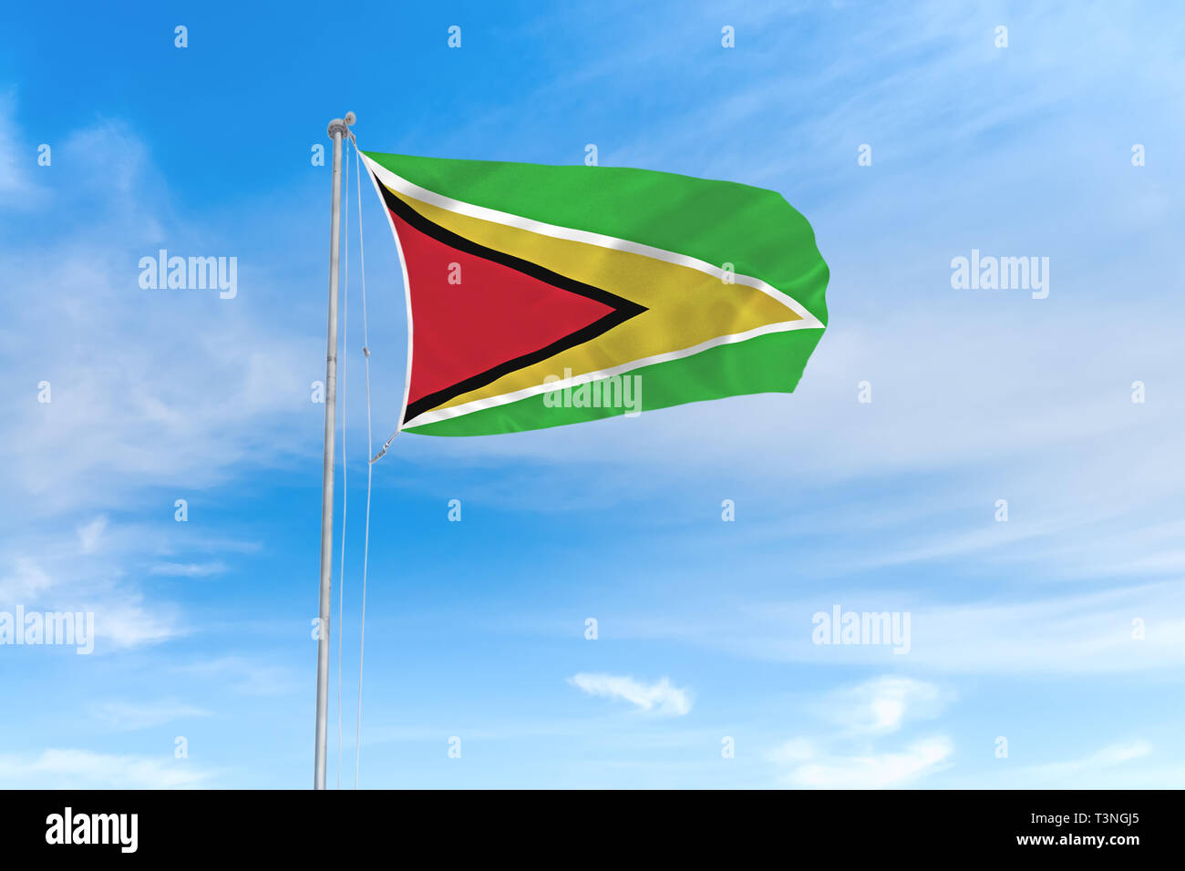 Guyana Flagge weht im Wind über blauen Himmel Hintergrund Stockfoto