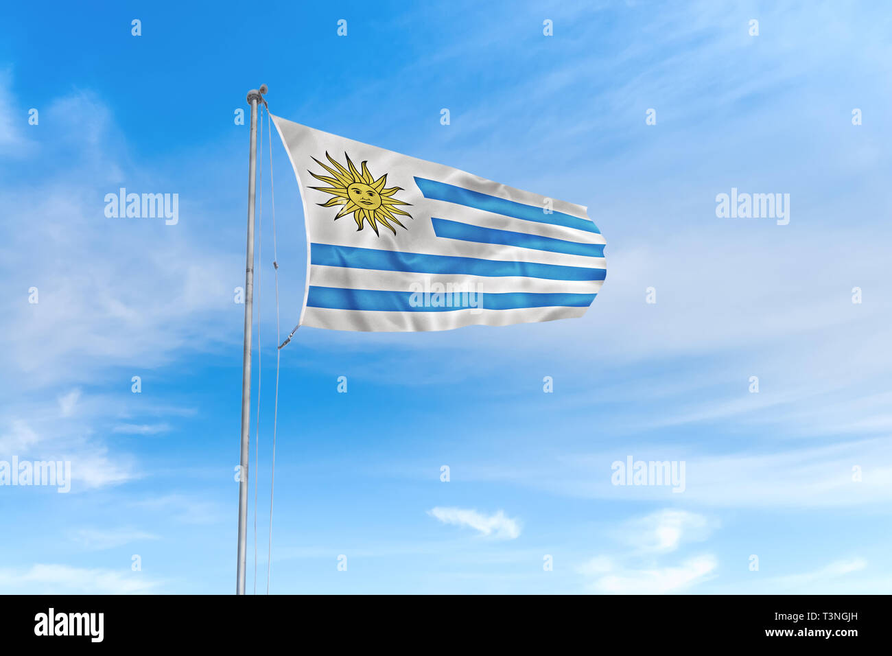 Uruguay Flagge weht im Wind über blauen Himmel Hintergrund Stockfoto