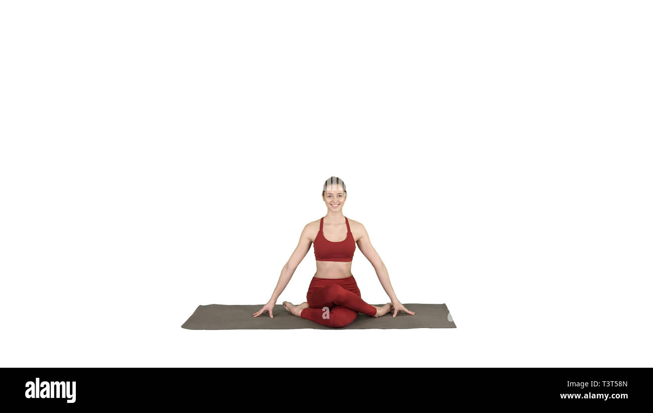 Junge attraktive Frau Üben Yoga, in Gomukasana Übung sitzen, Kuh Gesicht Pose auf weißem Hintergrund. Stockfoto