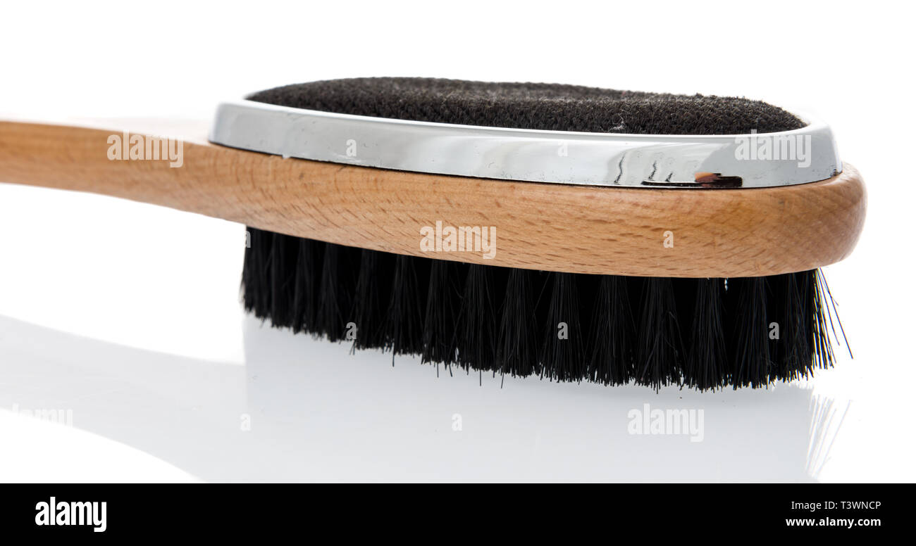 Eine Kleiderbürste und Flusen entferner Bürste Kombination auf einem isolierten Stockfoto