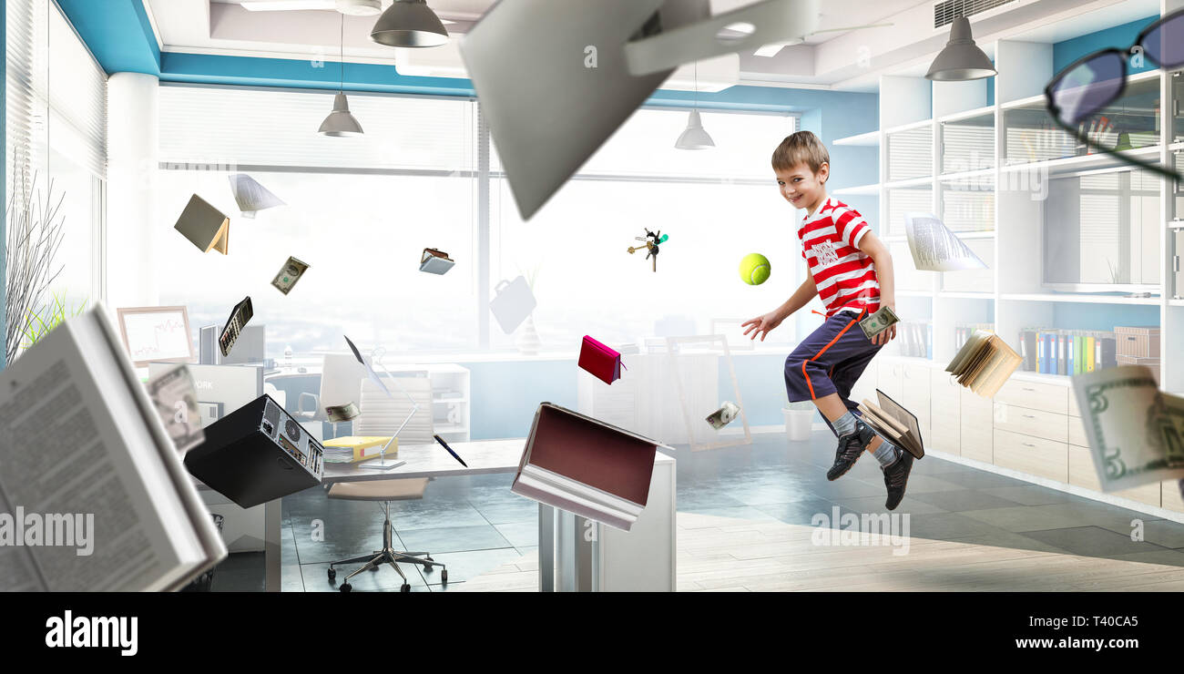 Niedliche happy little boy jumping. Mixed Media Stockfoto