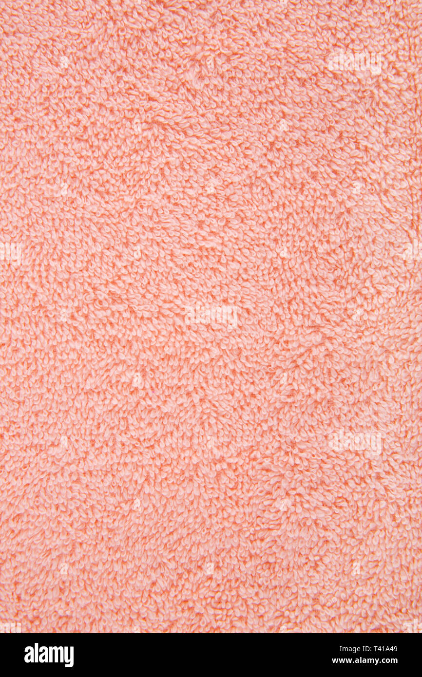 Pfirsich Farbe Handtuch Textur als Hintergrund, Nahaufnahme Bild. Stockfoto