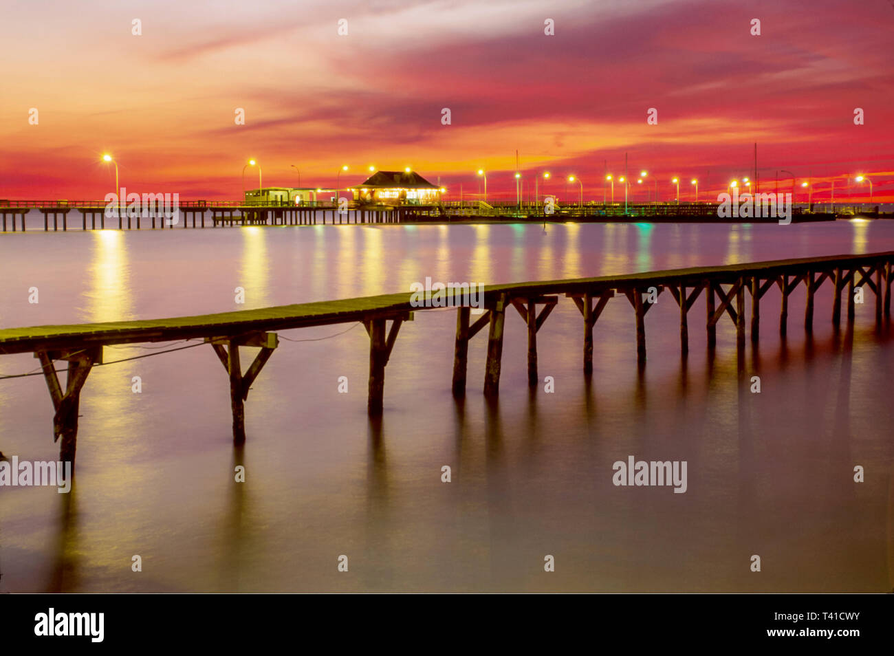 Alabama Fairhope City Pier Mobile Bay Sonnenuntergang, malerische Wasser Abenddämmerung, Stockfoto