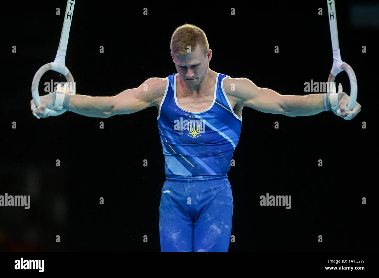 Yevgen Yudenkov aus der Ukraine in Aktion auf der Ringe während der Männer vielseitige Final des 8. Europäischen Meisterschaften im Turnen gesehen. (Tag 3) Stockfoto