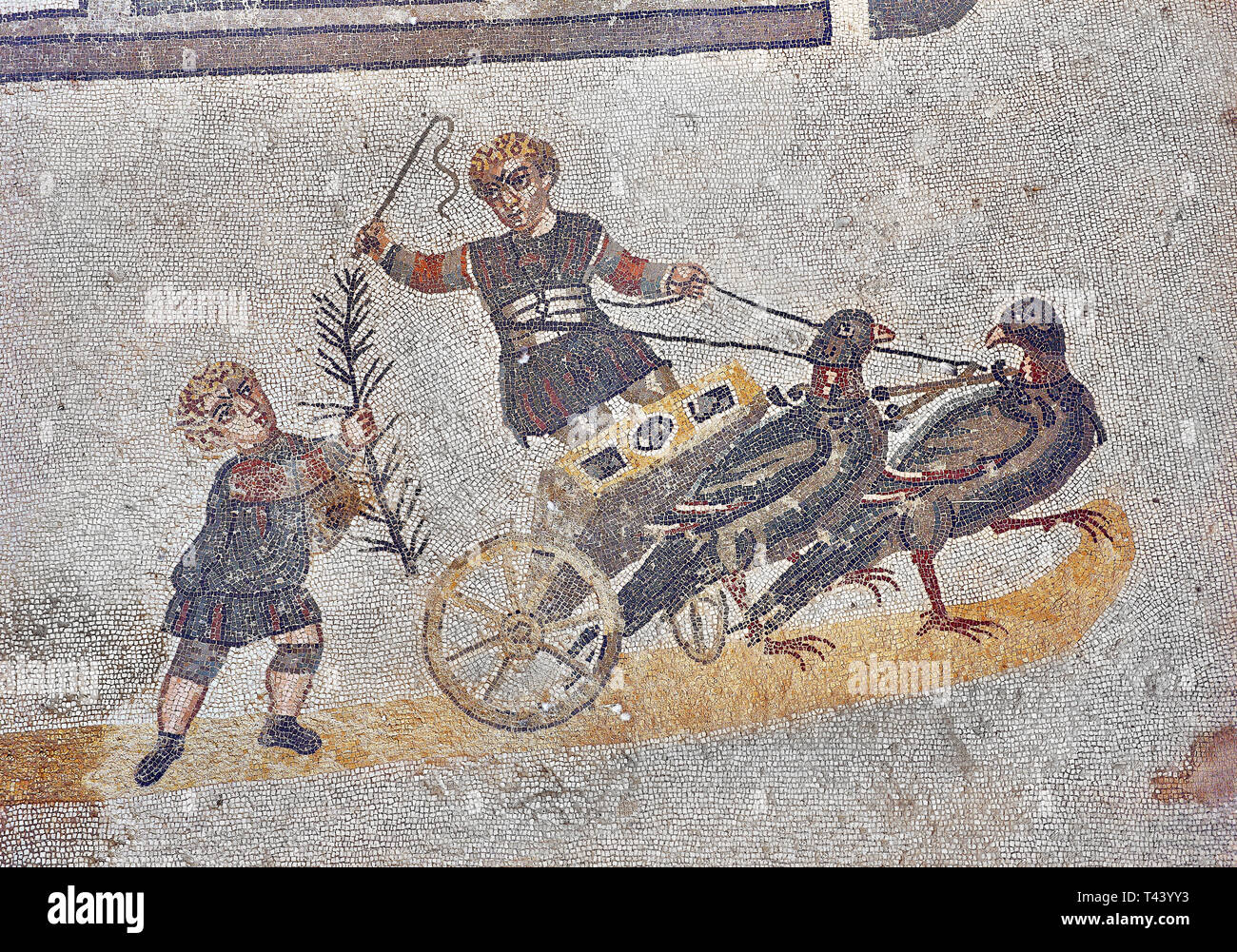 Die Roma Kinder Wagenrennen vom Vestibül des Smnall Circus, Zimmer Nr. 41 - römische Mosaiken in der Villa Romana del Casale, die containis der Ri Stockfoto