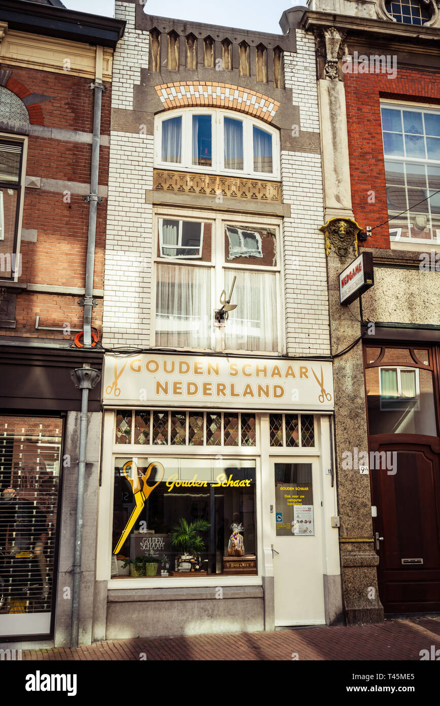 Dordrecht, Niederlande - März 03, 2019: Goldene Schaar logo und Verkaufsplattform Eingang. Golden Schaar oder goldenen Schere, ist eine der ältesten lokalen Gerinnselbildung Stockfoto