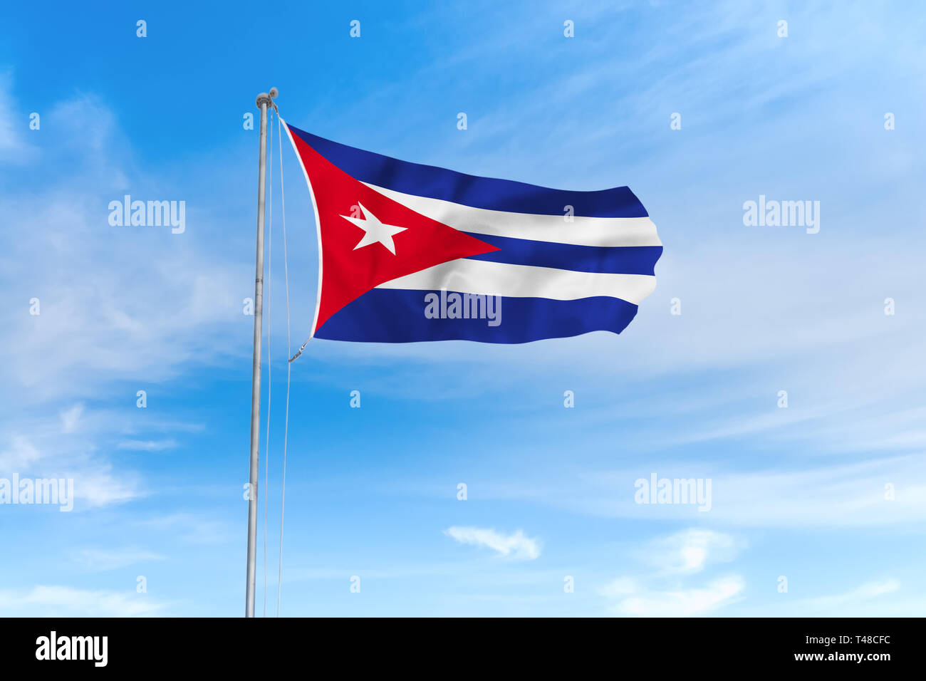 Kuba Flagge weht im Wind über blauen Himmel Hintergrund Stockfoto