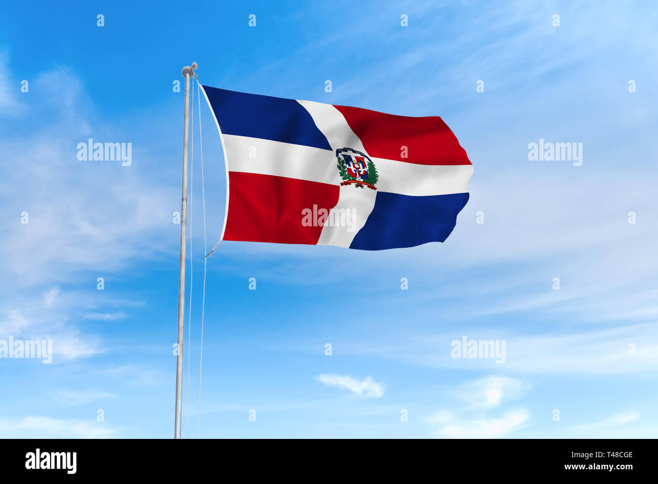 Dominikanische Republik Fahne weht im Wind über blauen Himmel Hintergrund Stockfoto