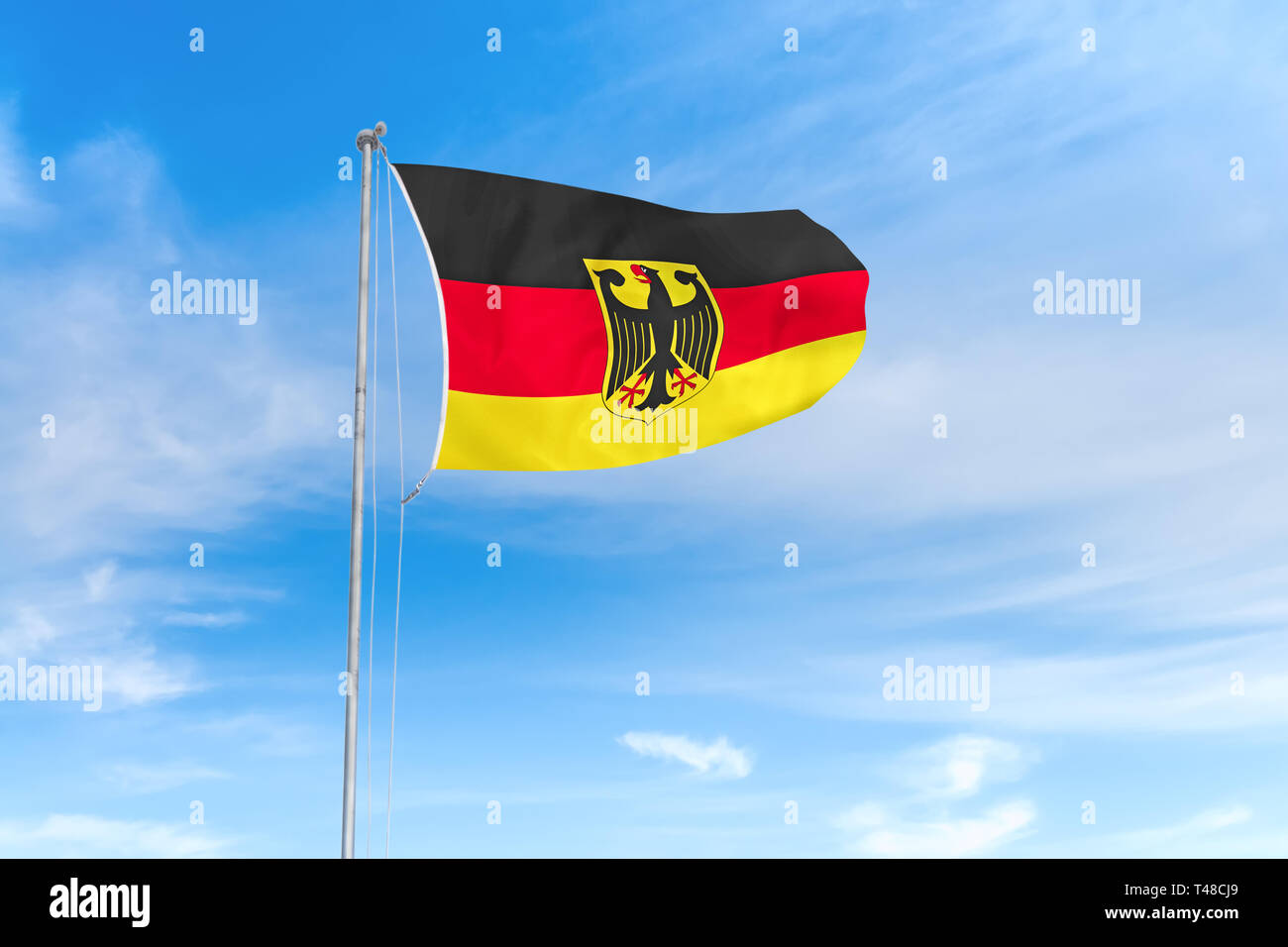 Deutschland Fahne weht im Wind über blauen Himmel Hintergrund Stockfoto