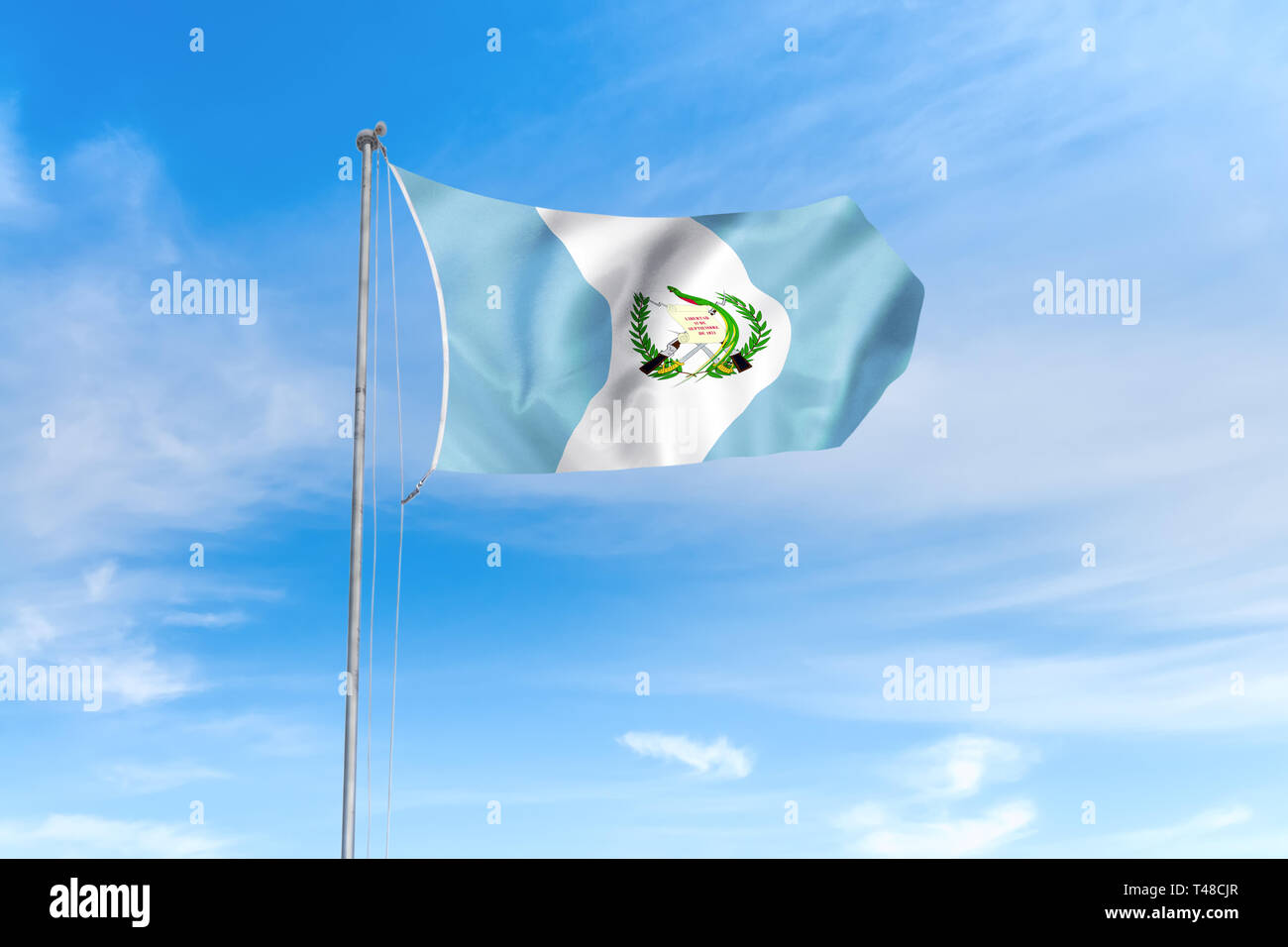 Guatemala Flagge weht im Wind über blauen Himmel Hintergrund Stockfoto