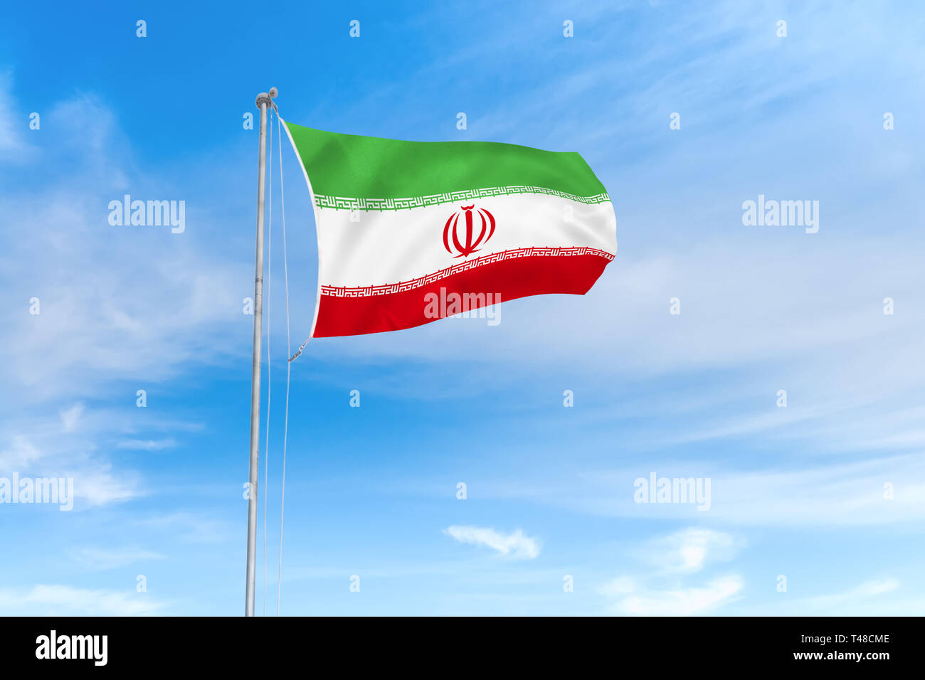 Iran Fahne weht im Wind über blauen Himmel Hintergrund Stockfoto
