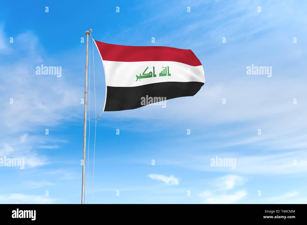 Irak Fahne weht im Wind über blauen Himmel Hintergrund Stockfoto