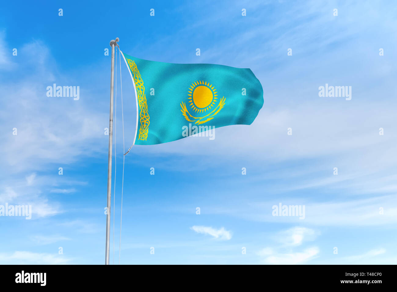 Kasachstan Fahne weht im Wind über blauen Himmel Hintergrund Stockfoto