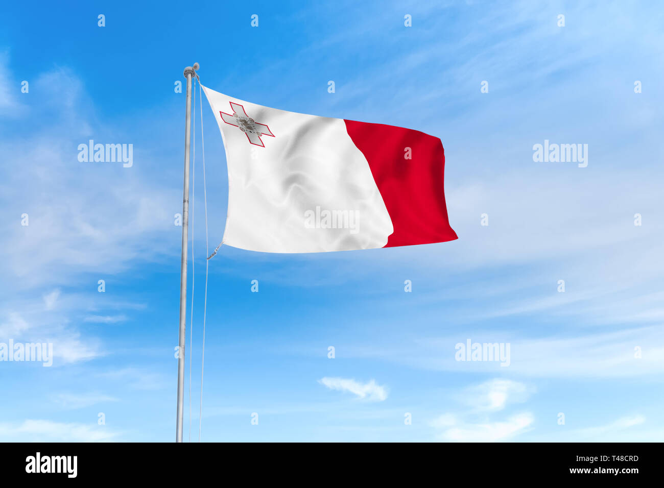 Malta Flagge weht im Wind über blauen Himmel Hintergrund Stockfoto