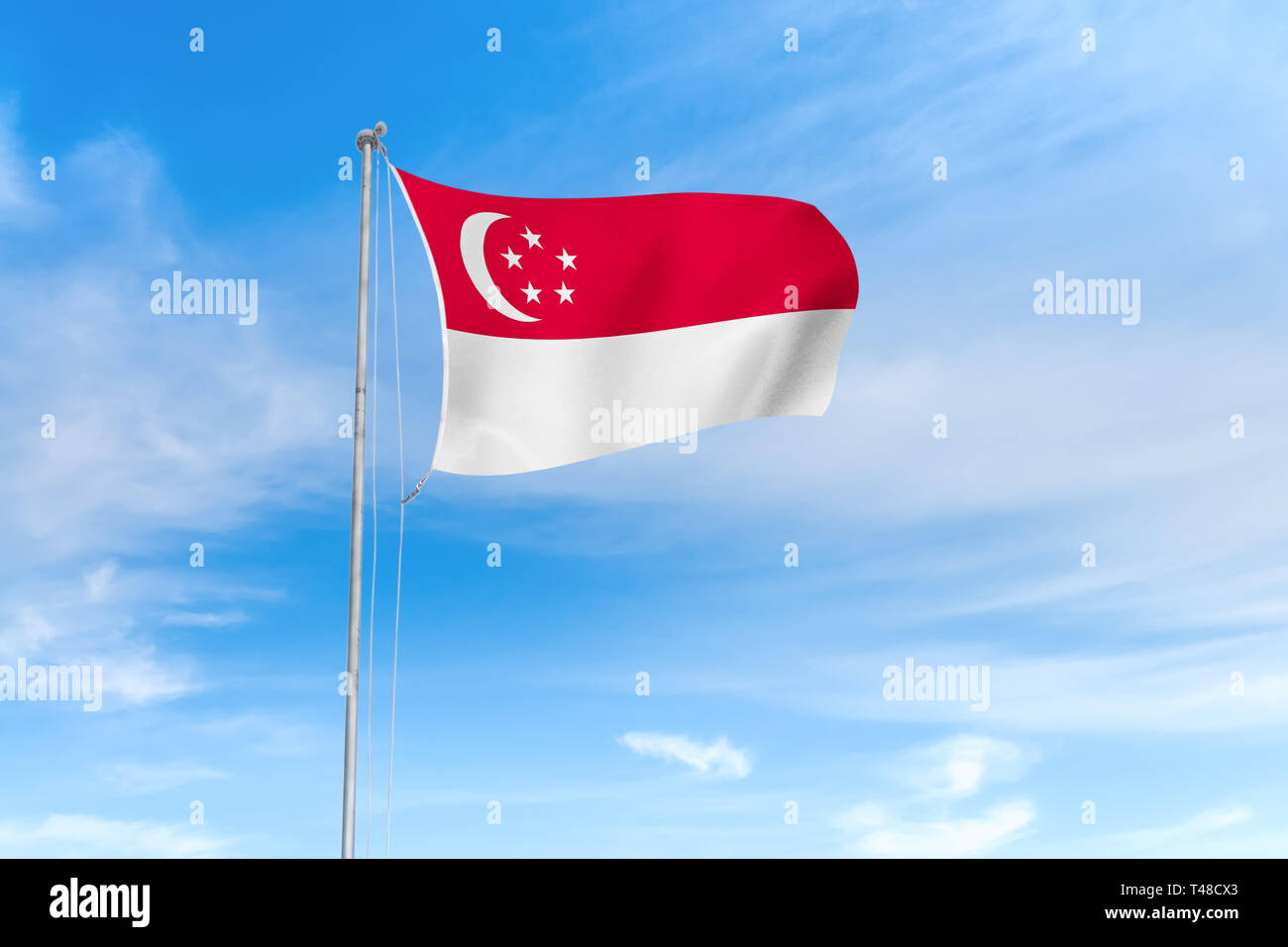 Singapur Fahne weht im Wind über blauen Himmel Hintergrund Stockfoto