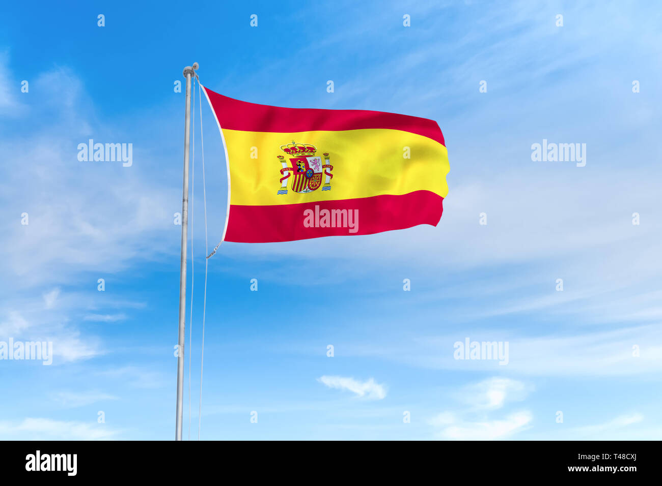 Spanien Flagge weht im Wind über blauen Himmel Hintergrund Stockfoto