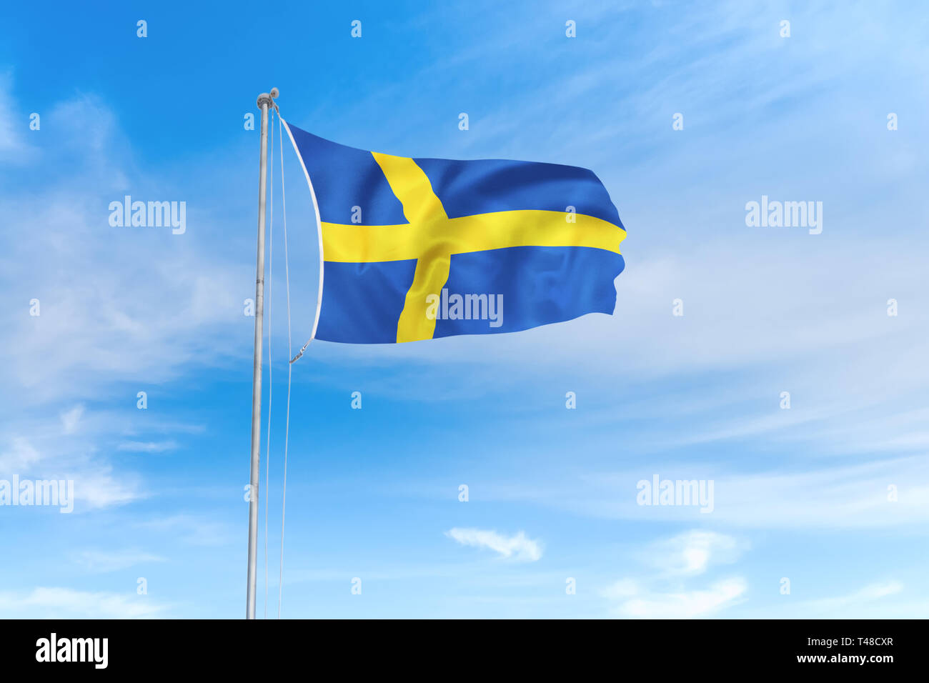 Schweden Flagge weht im Wind über blauen Himmel Hintergrund Stockfoto