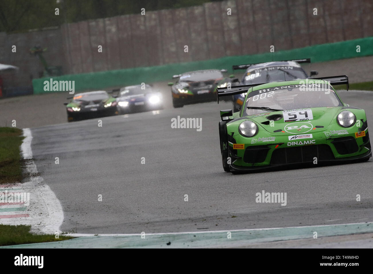 Monza, Italien. 14 Apr, 2019. Dinamic Motorsport Porsche 911 GT3 R mit Treibern Andrea Rizzoli, Klaus Bachler & Zaid Ashkanani während der 2019 Blancpain GT Serie am Autodromo di Monza, Monza, Italien am 14. April 2019. Foto von Jurek Biegus. Nur die redaktionelle Nutzung, eine Lizenz für die gewerbliche Nutzung erforderlich. Keine Verwendung in Wetten, Spiele oder einer einzelnen Verein/Liga/player Publikationen. Credit: UK Sport Pics Ltd/Alamy leben Nachrichten Stockfoto