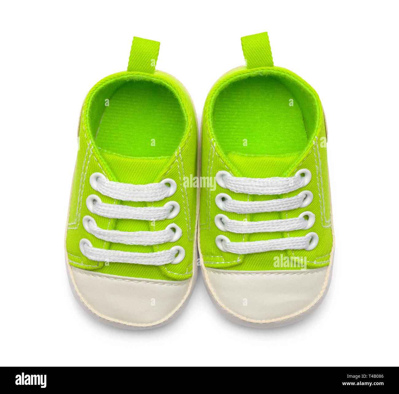 Paar grüne Baby Schuhe Top View isoliert auf weißem Hintergrund. Stockfoto