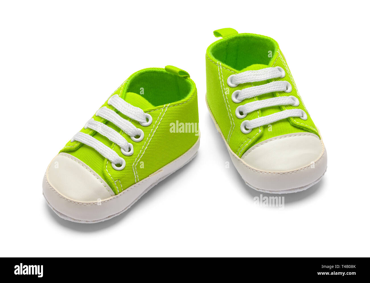 Paar grüne Baby Schuhe isoliert auf weißem Hintergrund. Stockfoto