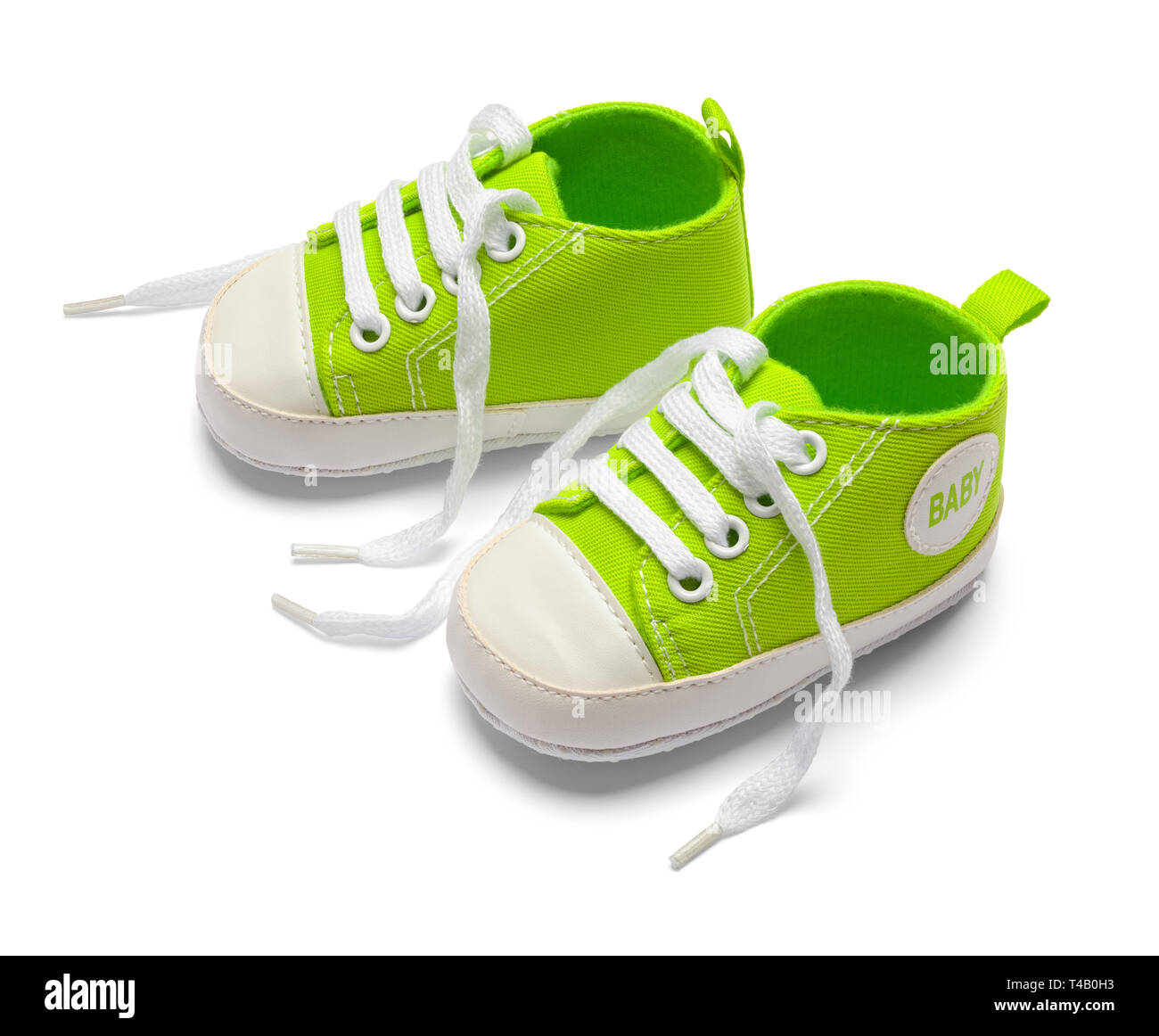 Open Green Baby Schuhe isoliert auf weißem Hintergrund. Stockfoto