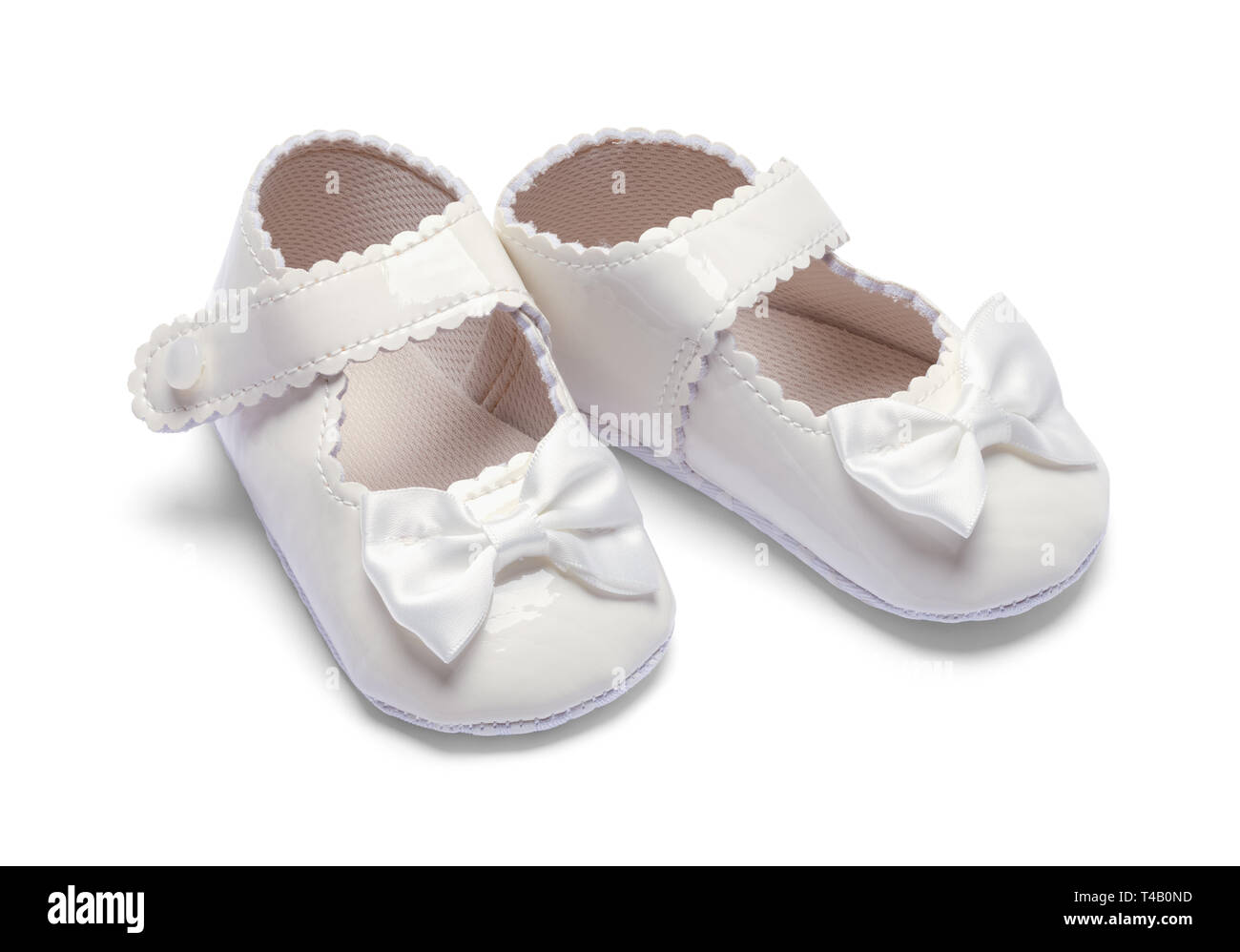Zwei Mädchen Baby Schuhe isoliert auf weißem Hintergrund. Stockfoto