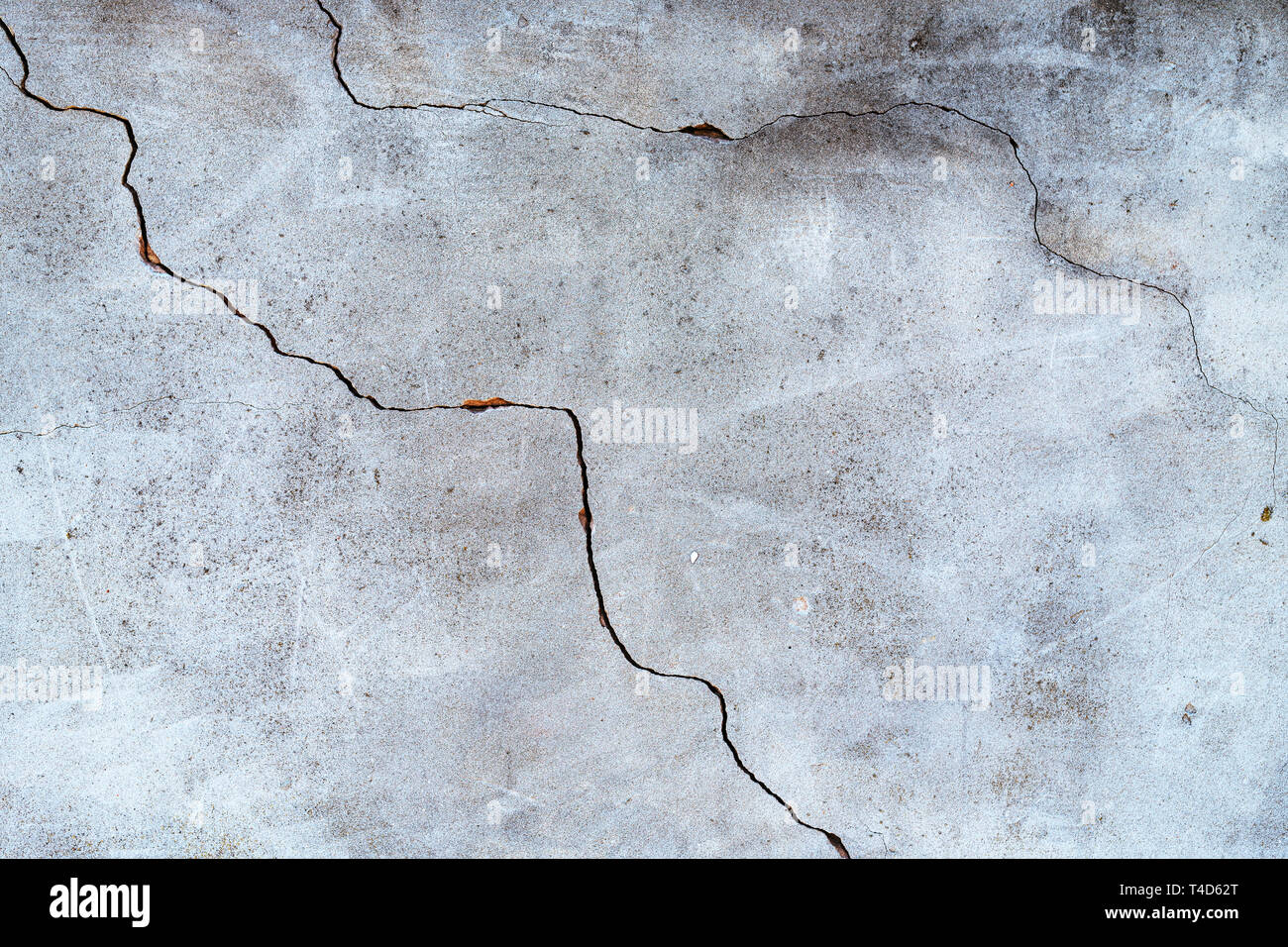 Beton wand hintergrund, Zement Oberfläche mit Risse Risse Stockfoto