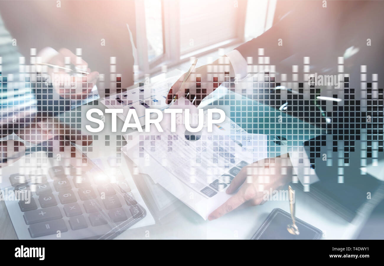 Erfolgreiche Teamarbeit und Existenzgründung Konzept. Inschrift auf dem Bildschirm: Startup. Wirtschaft Wirtschaft. Stockfoto