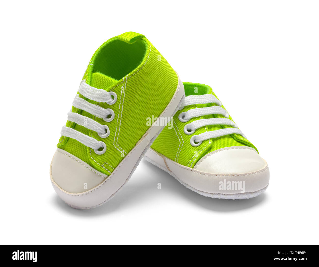 Zwei grüne Baby Schuhe isoliert auf weißem Hintergrund. Stockfoto