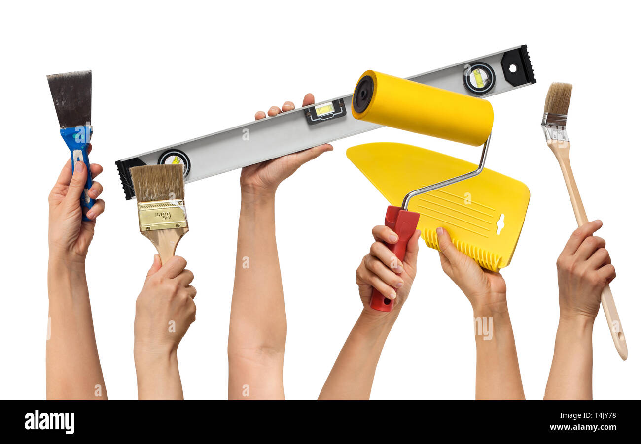 Einstellen der Werkzeuge zur Reparatur in die Hände, auf weißem Hintergrund Stockfoto