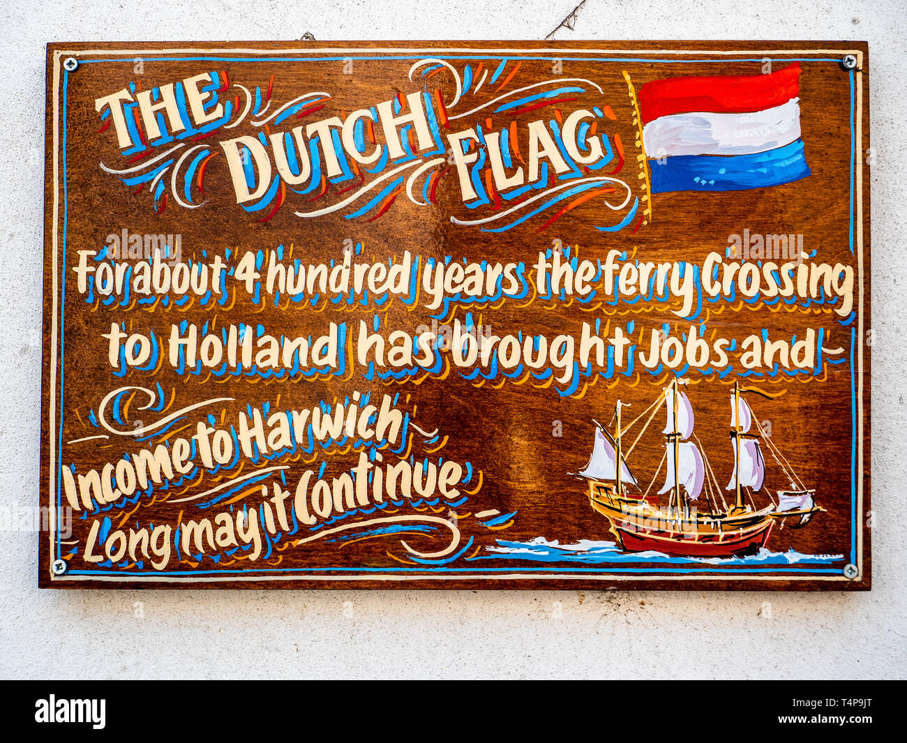 Die niederländische Flagge Harwich - Bekanntmachung über die Mauer der niederländischen Flagge Kneipe im Hafen von Harwich, unterstützt weiterhin den Handel mit Holland. Stockfoto