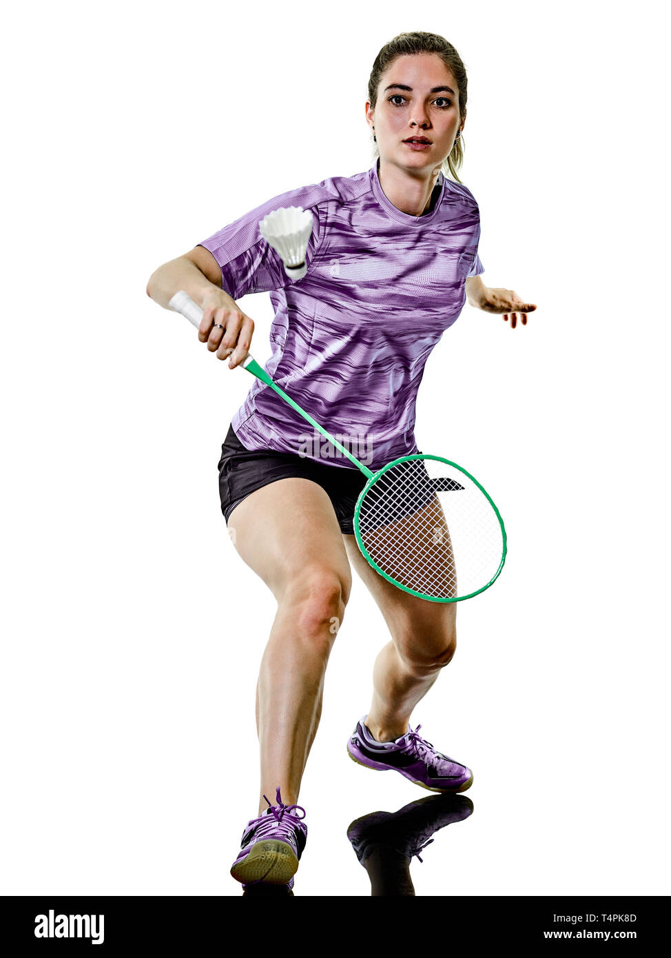 eine kaukasische junger Teenager Mädchen Frau spielt Badminton-Spieler isoliert auf weißem Hintergrund Stockfoto