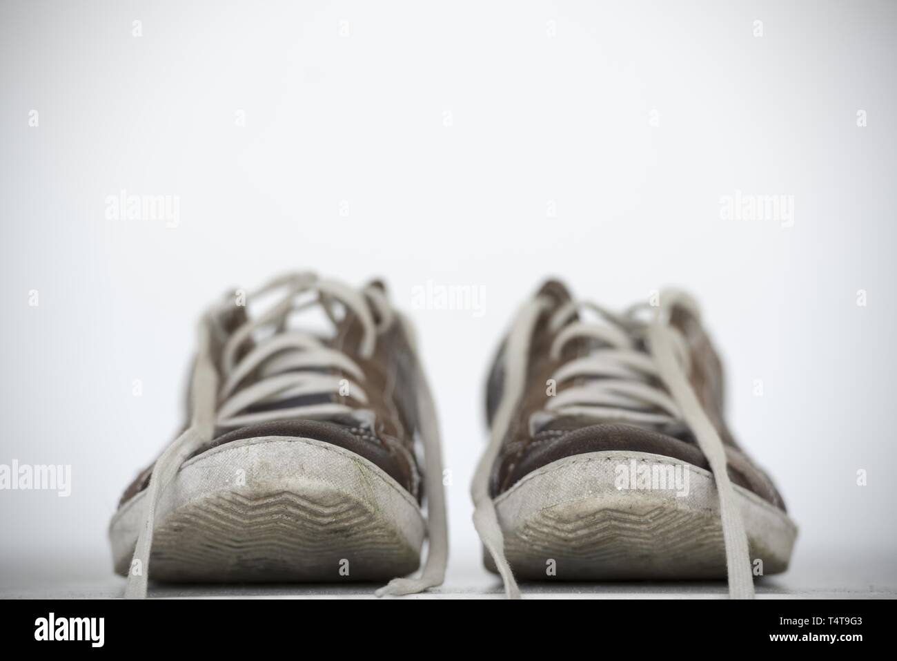 Schmutzige Schuhe. Stockfoto