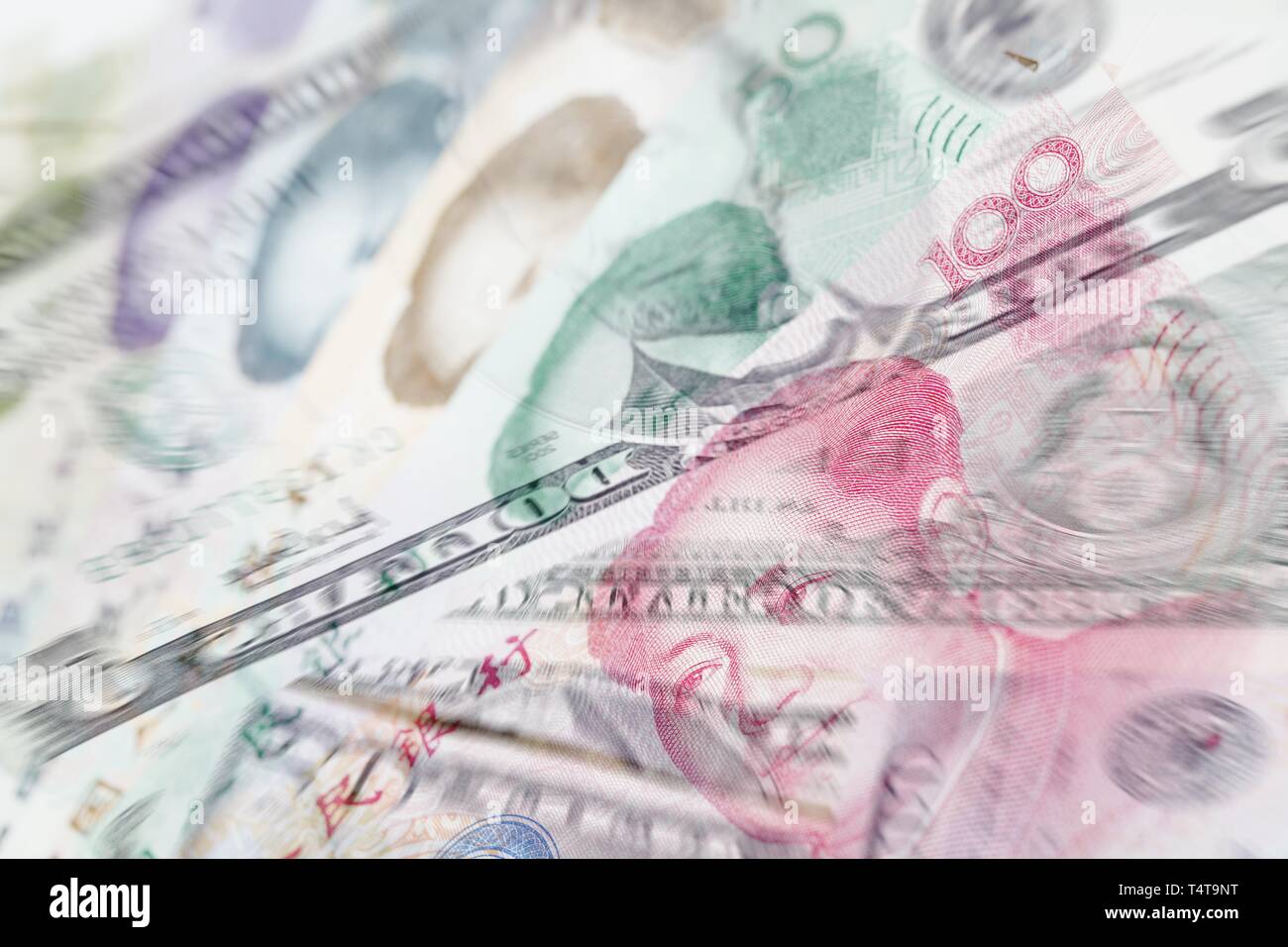 Chinese Yuan und US Dollar Noten, verwischt, Symbol Foto Stockfoto